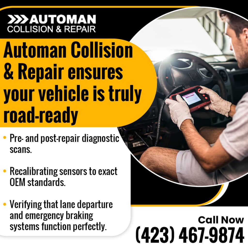 Technician using a diagnostic scan tool inside a vehicle at Automan Collision & Repair for pre- and post-repair system checks and sensor verification